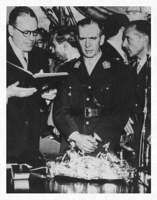 Lonardi con el escribano Garrido